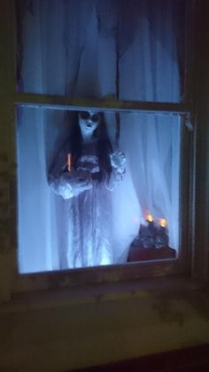 girl ghost in window